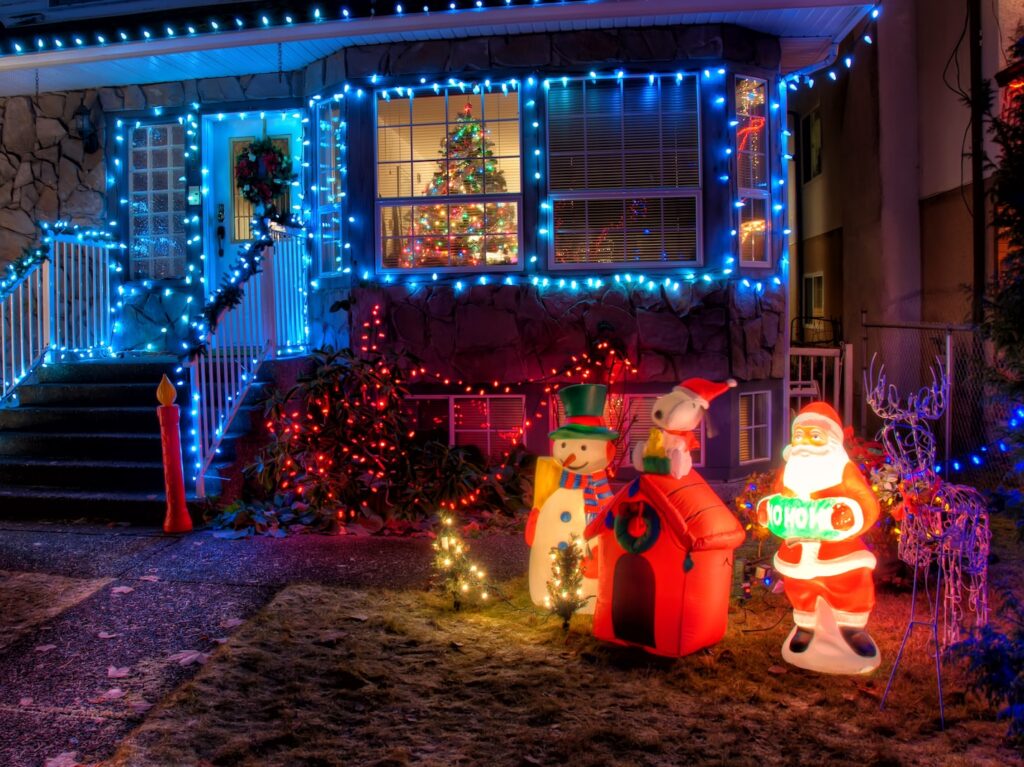 snowman and santa claus near house decor