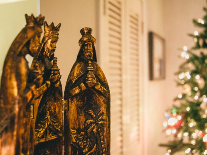 selective focus photography of religious figurines